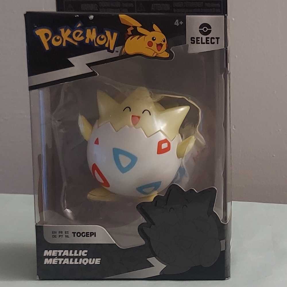 Pokemon Togepi Metallic Figure - White, Yellow, Red, Blue